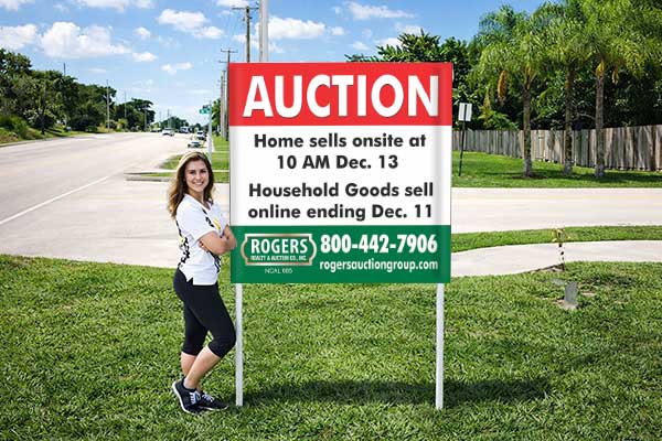 4x4 real estate sign with patented post pockets and metal post kit installed outdoors