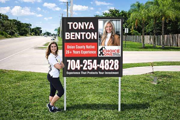 Real Estate Agent Signs installed outdoors